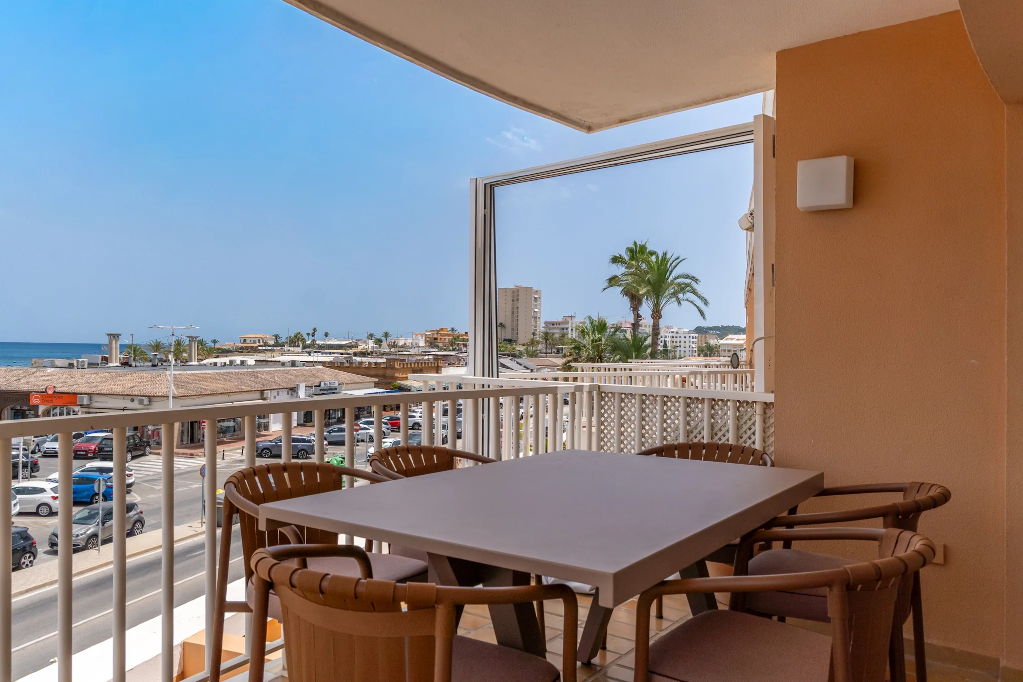 La Brisa balcony with outdoor dining and sea view